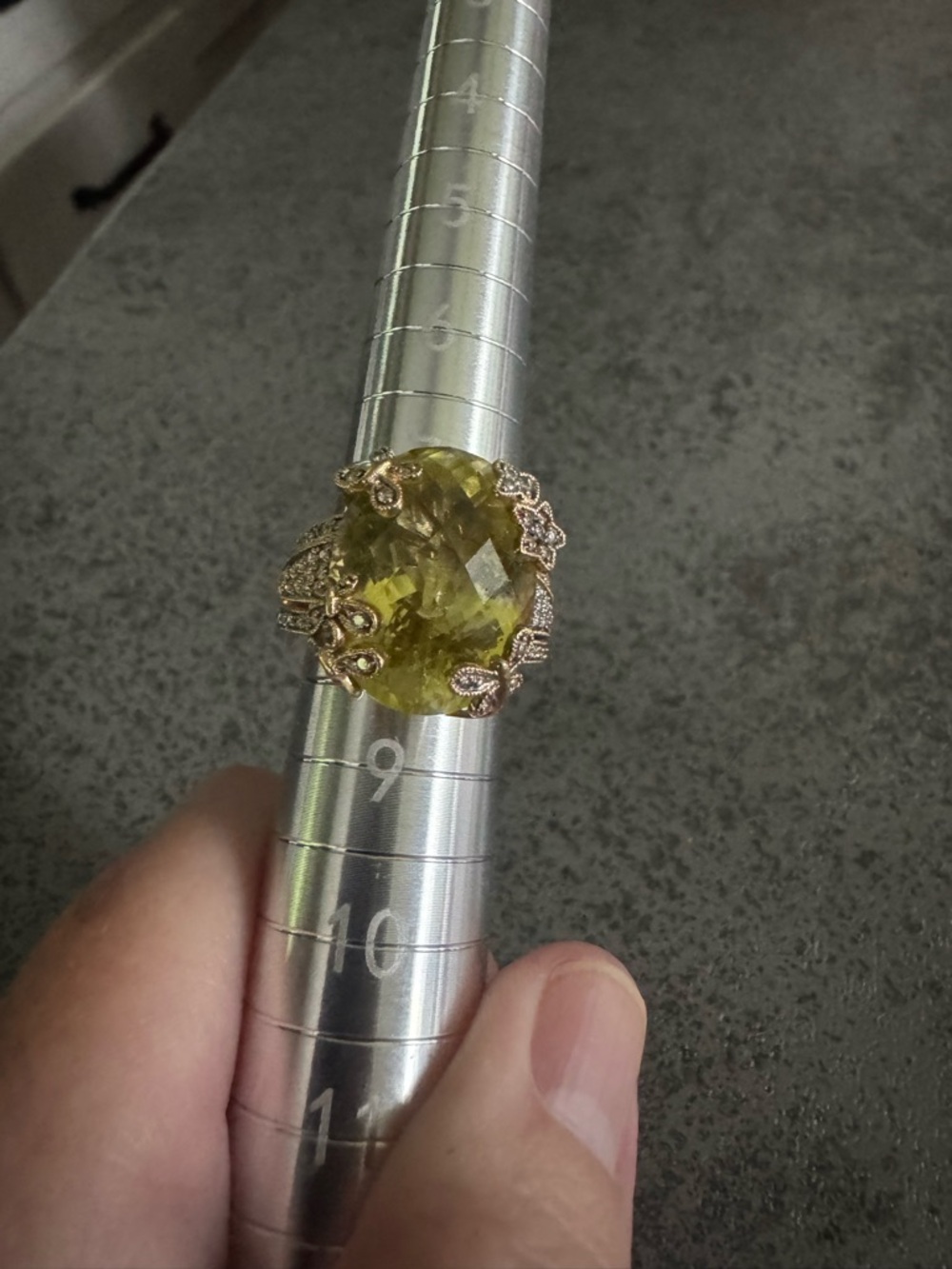 14K huge Green Tourmaline Surrounded By An Intricate Band